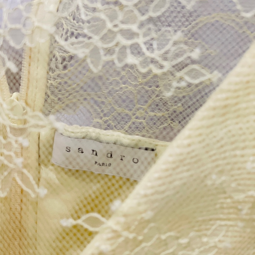 Sandro
Flared pleated lace and plissée-woven mini dress. Size: FR 34. - Picture 8 of 9